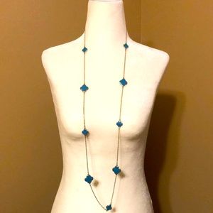 Gold tone turquoise color clover necklace